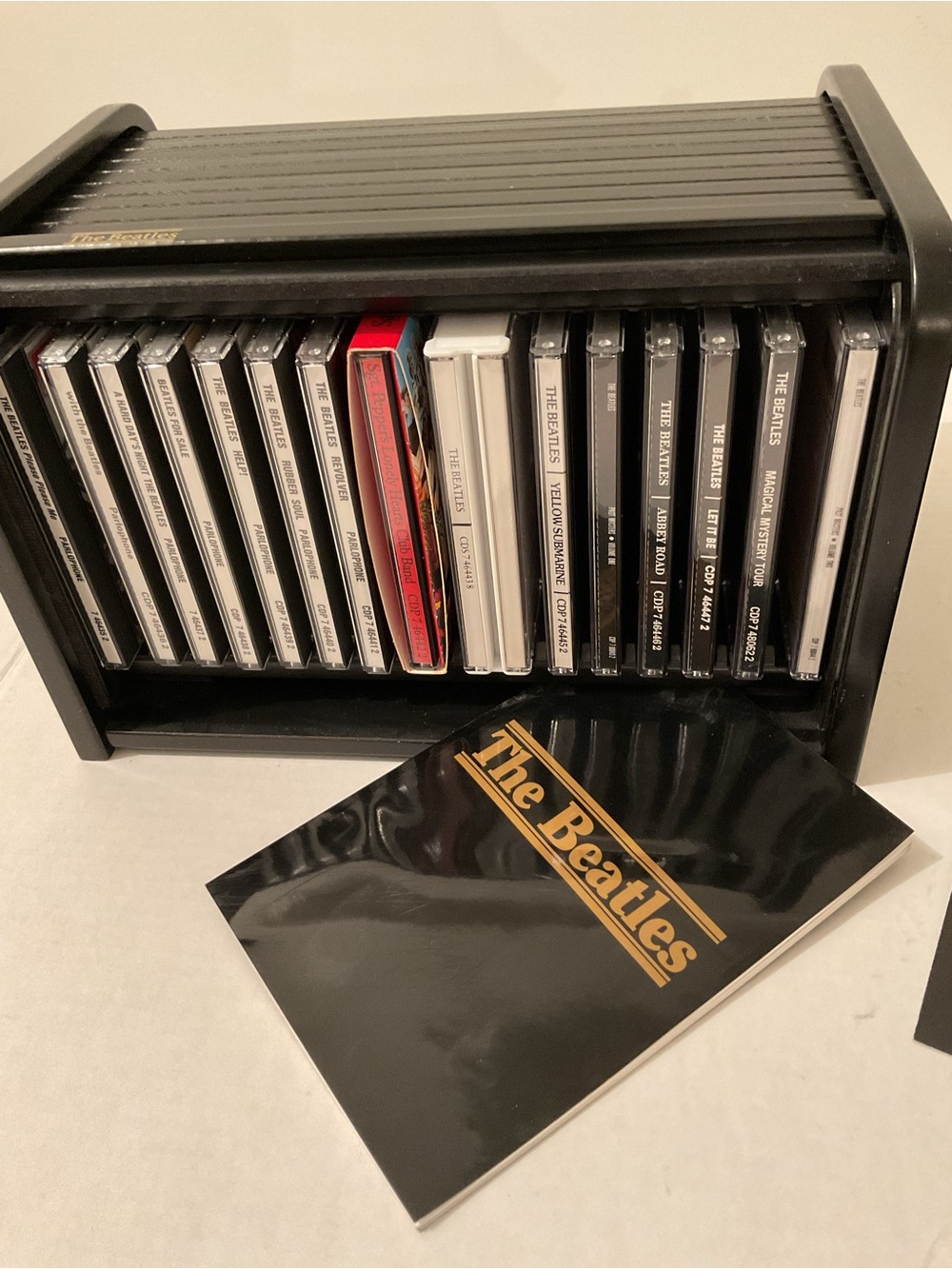 The Beatles Black Slatted Roll-Top Storage Chest with cd collection